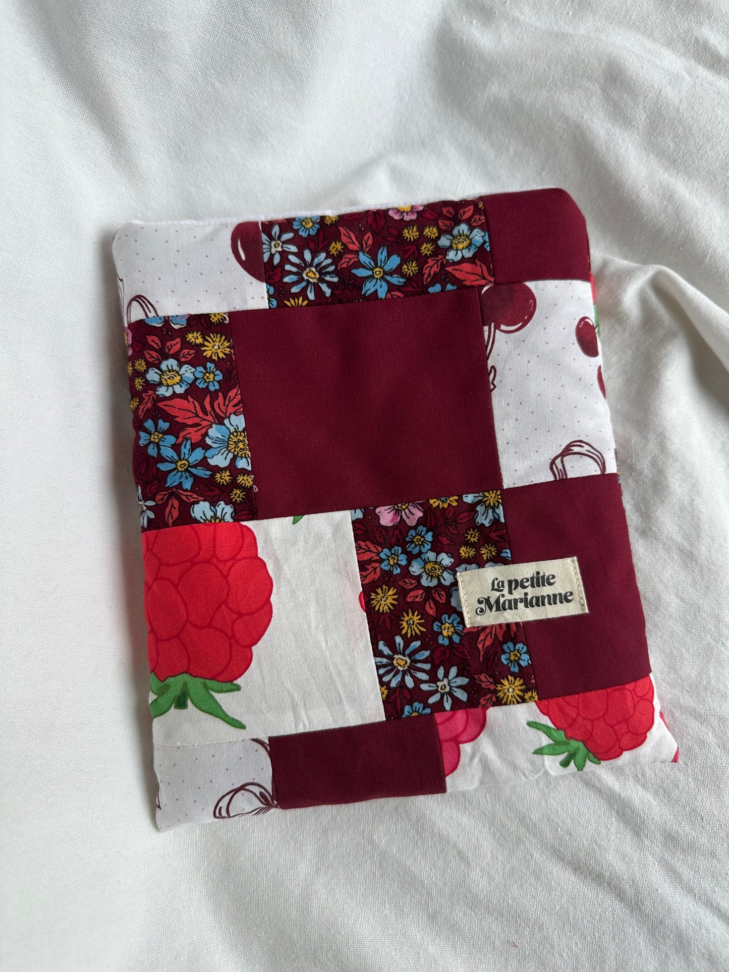 Housse à livre broché patchwork rouge